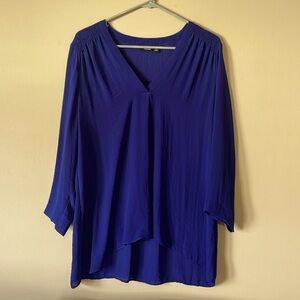 A.N.A blouse in a dark blue/purple color.